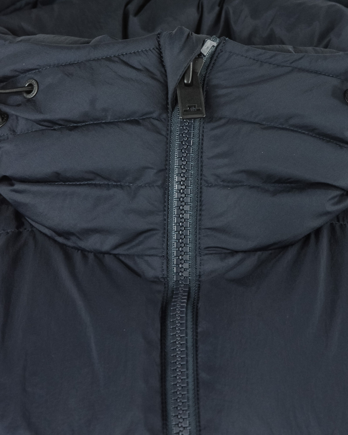 Dark navy crinkle down jacket close-up of center zipper and collar