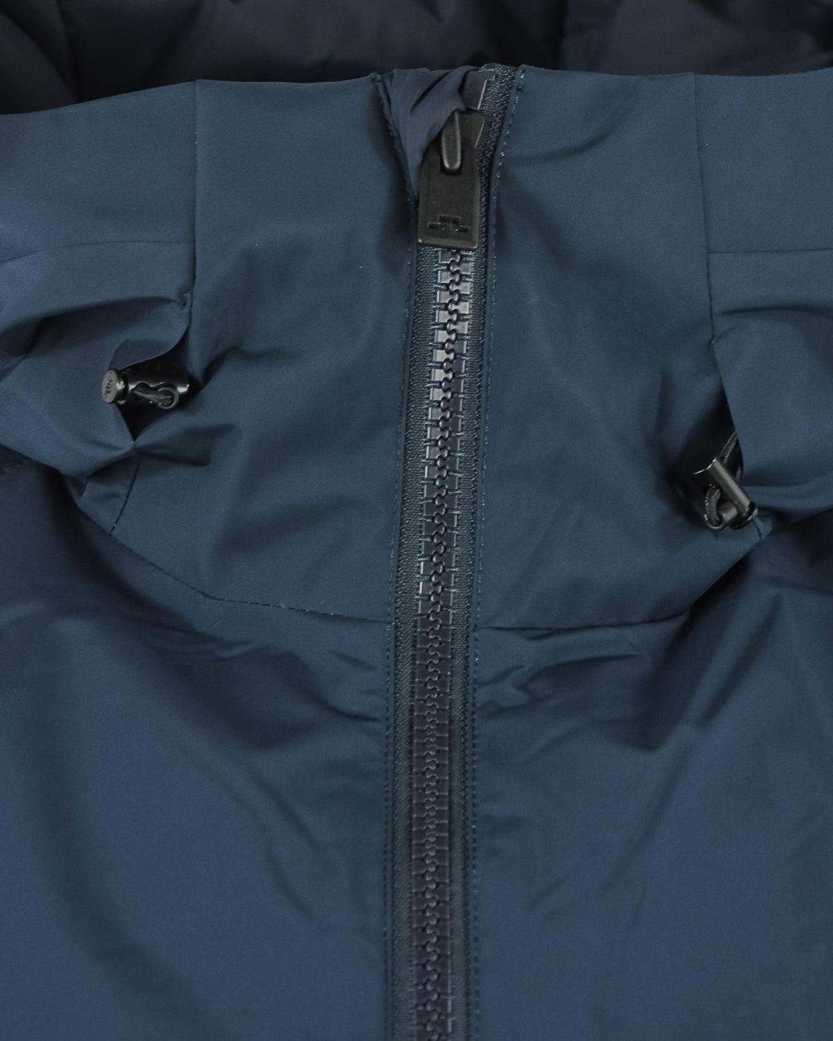 Navy down jacket upper front with hood drawcord and zipper