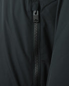 Close-up of black front zipper and top placket on down jacket