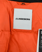 Orange down jacket lining with J.Lindeberg square brand label