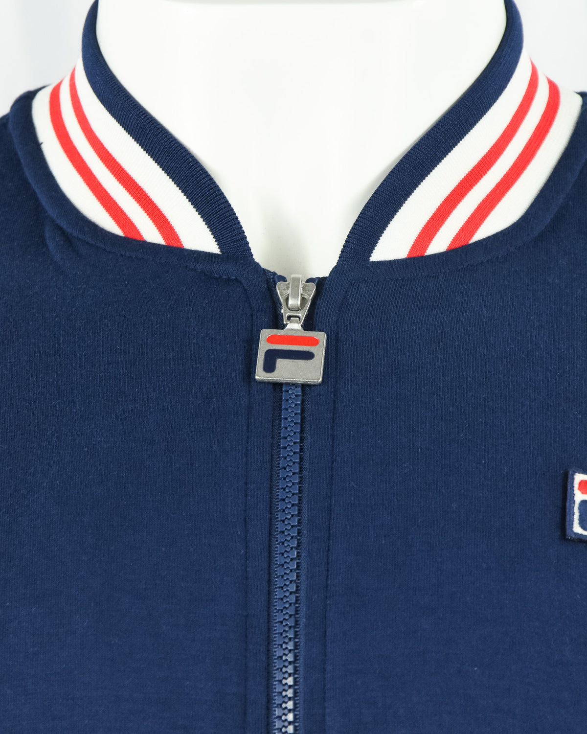 Navy baseball track jacket with striped stand collar and front zipper