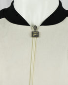 Cream baseball jacket collar and full-zip with Fila zipper pull and black trim