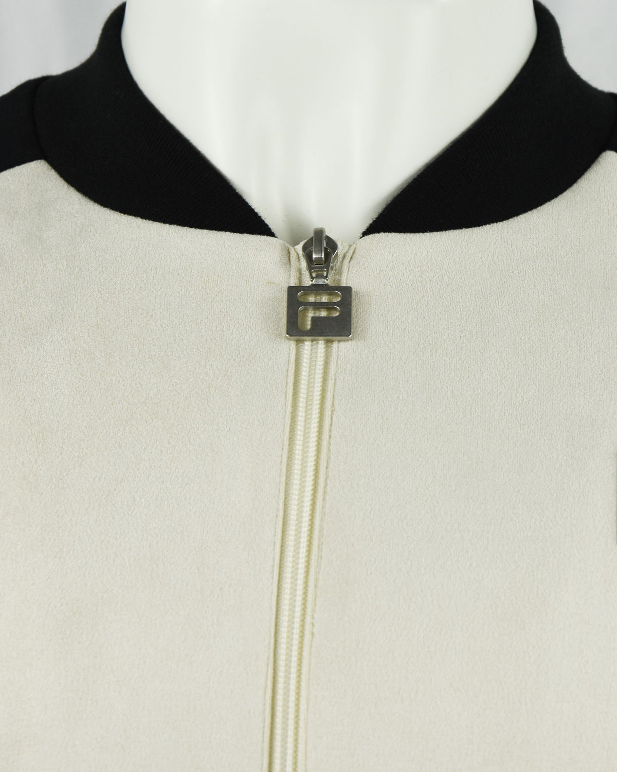 Cream baseball jacket collar and full-zip with Fila zipper pull and black trim