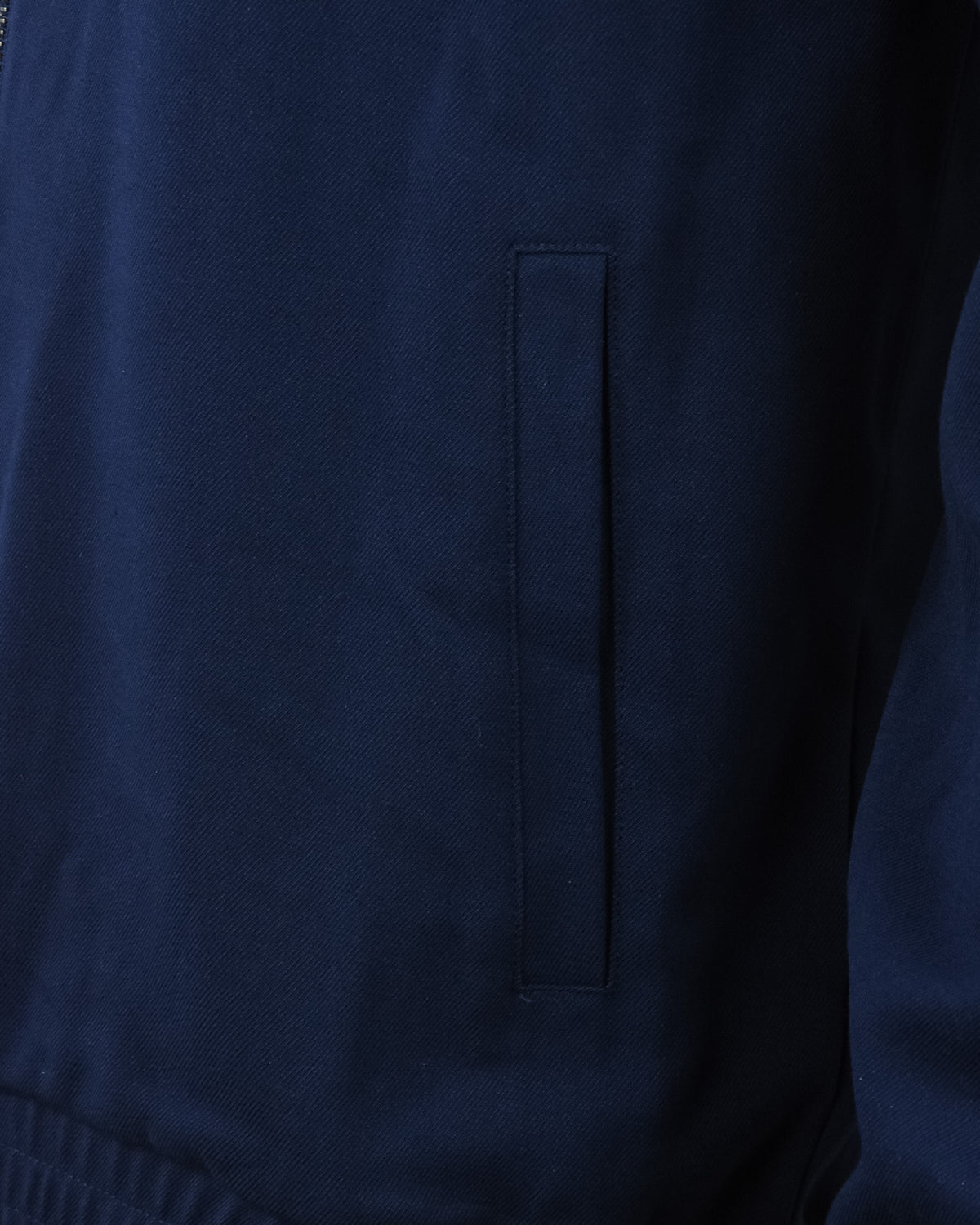 Navy track jacket with rectangular pocket flap on front