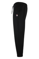 Black jogger pants with small Fila logo on the side and ankle cuff