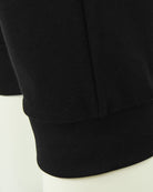 Black ribbed ankle cuff on jogger pants hem