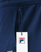 Navy jogger pants elastic waistband with drawstring and logo tag