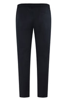 Navy drawstring tech pants with elastic waistband, back view