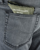 Grey denim front pocket with stitched outline and Jacob Cohen Milano label