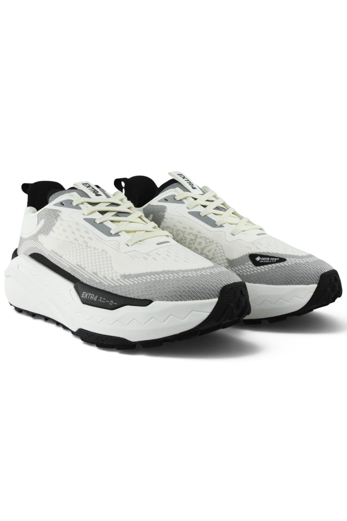Pair of white and gray waterproof runners with light green laces and black trims