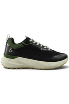 Waterproof GTX running shoe in black with green accents, white laces, thick sole