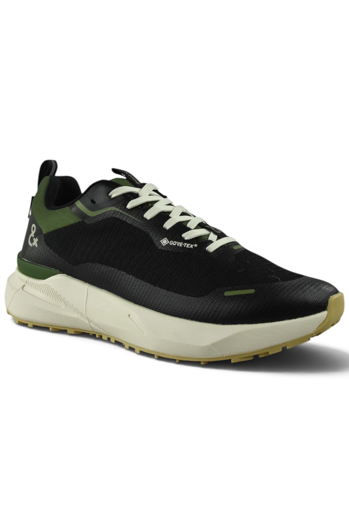 Waterproof GTX running shoe side view in black with green trim, white lace-up