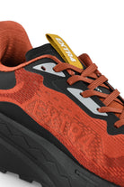Rust orange and black waterproof runner shoes with orange laces and black rubber sole