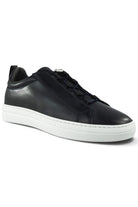 Dark navy leather low-top trainer sneaker with lace-up and metal toggle detail.