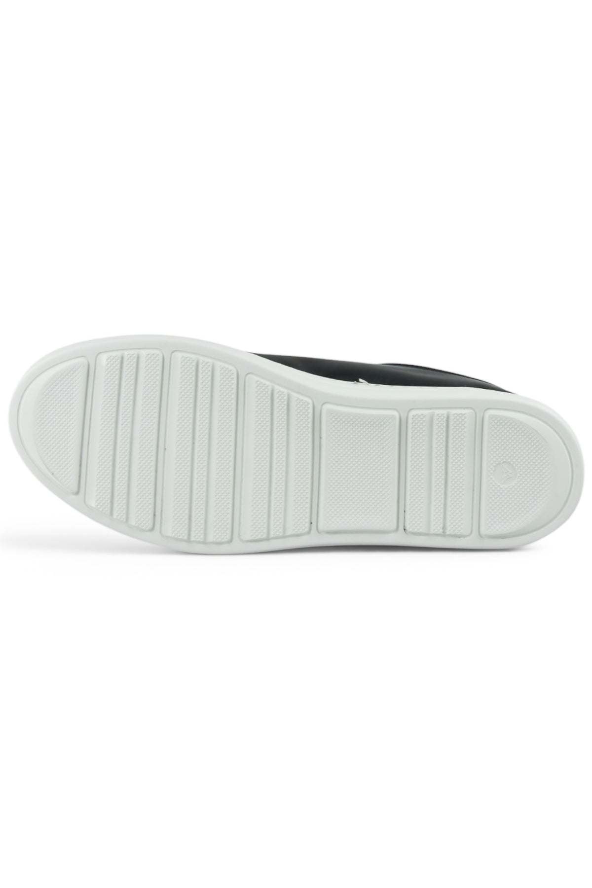White rubber outsole with textured tread for a navy low-top leather sneaker.