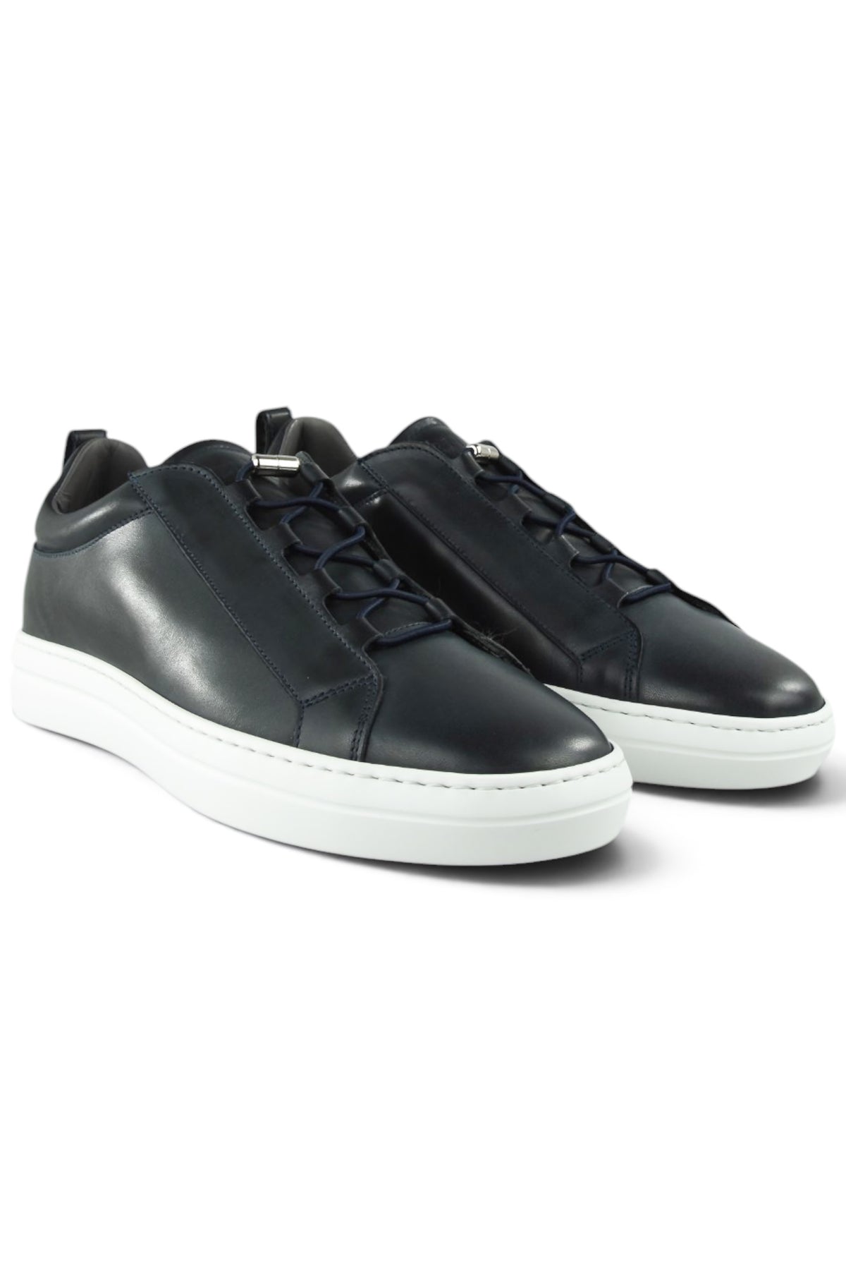 Pair of navy leather low-top sneakers with lace-up front and white rubber sole.