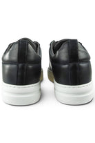 Back view of navy leather low-top sneakers with padded collar and white midsole.