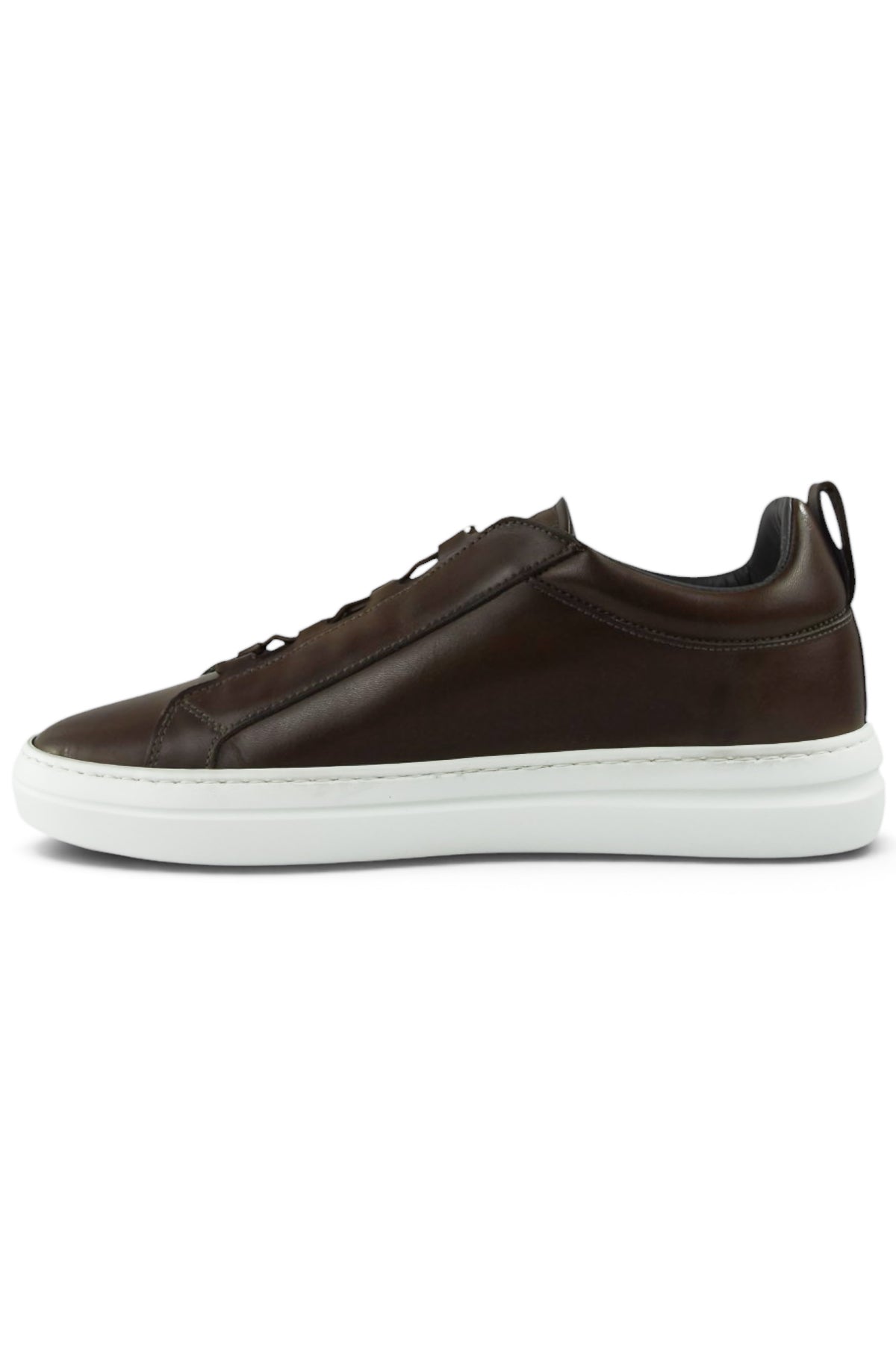 Brown leather low-top trainer with lace-up and white rubber sole, angled view