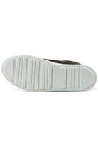 White rubber outsole for a low-top trainer with textured traction pattern