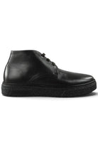 Black leather lace-up ankle boot with rounded toe and thick textured rubber sole.