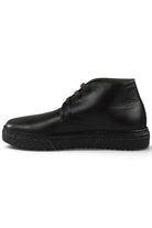 Black leather lace-up ankle boot with rugged outsole and smooth upper panel.