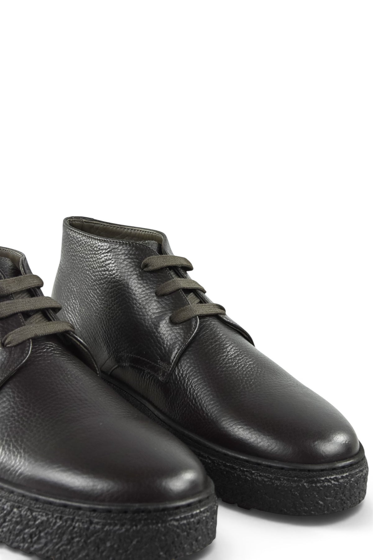 Pair of dark leather lace-up ankle boots with chunky gripped sole
