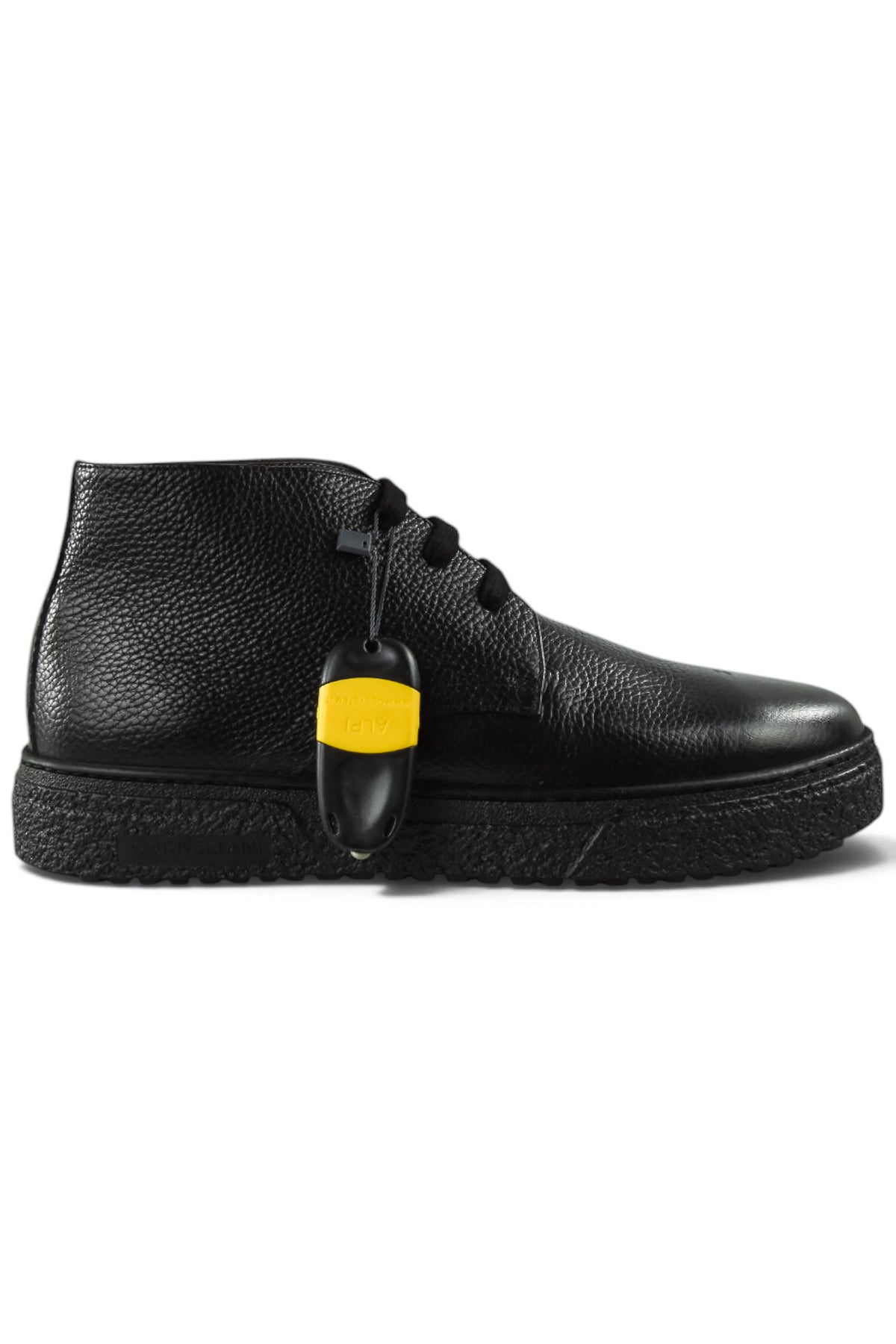 Black leather lace-up ankle boot with hanging tag and thick textured sole.