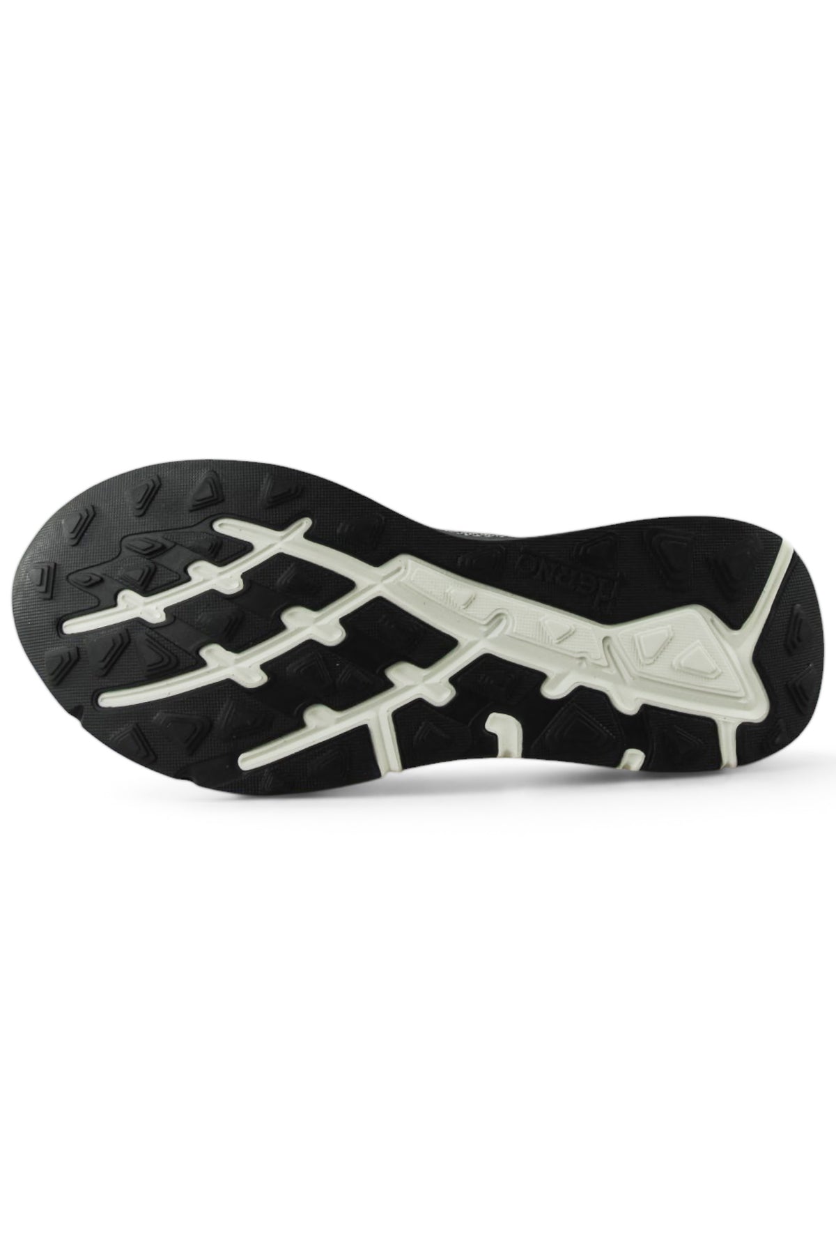 Trainer outsole view with black rubber tread and light patterned traction panels