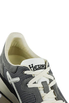 Grey trainers with white laces and Herno logo on tongue, olive-toned lining