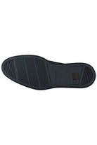 Outsole view of blue suede chukka desert boots with treaded rubber sole.