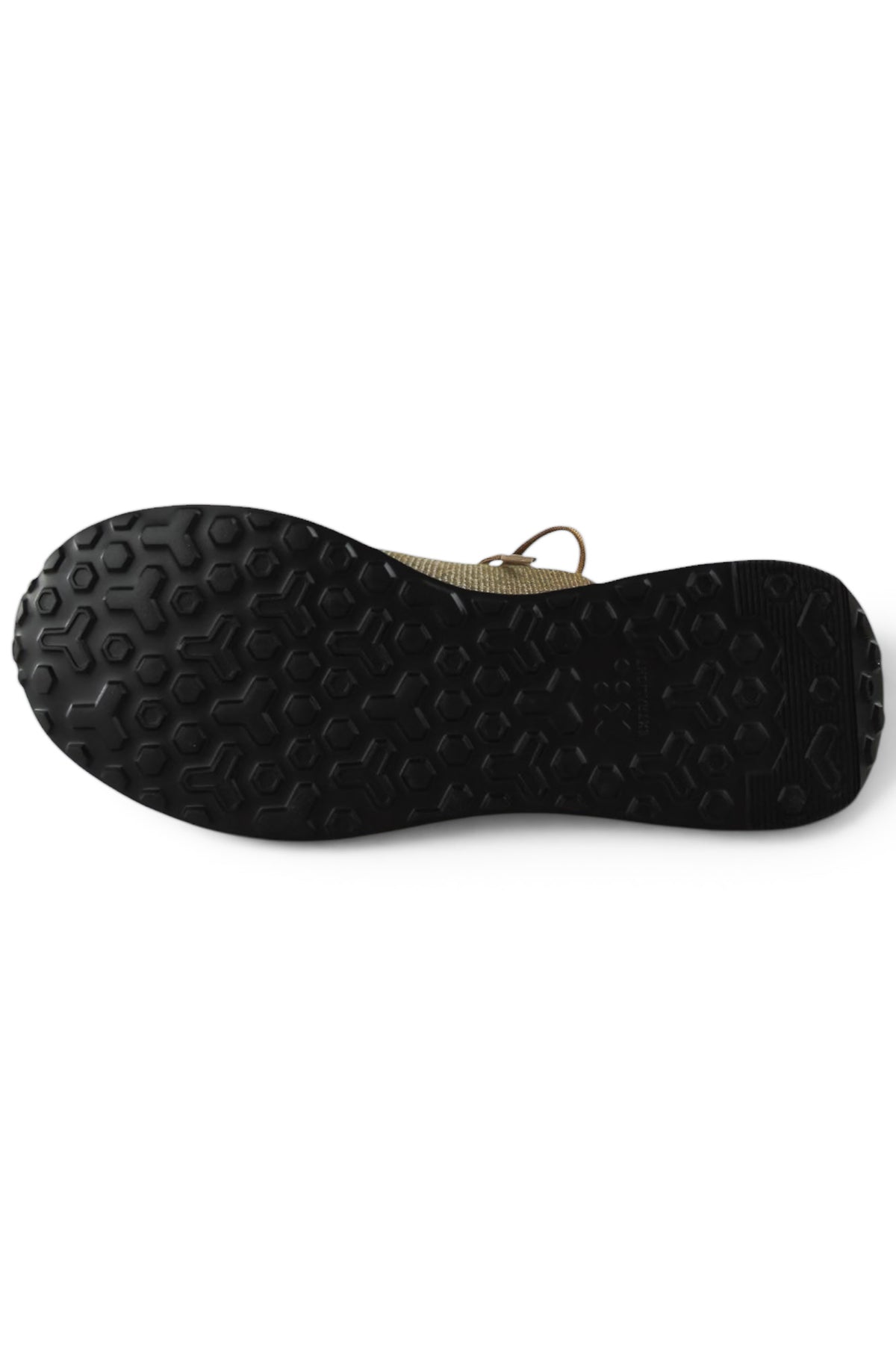 Black rubber outsole with textured tread for lace-up tan trainers