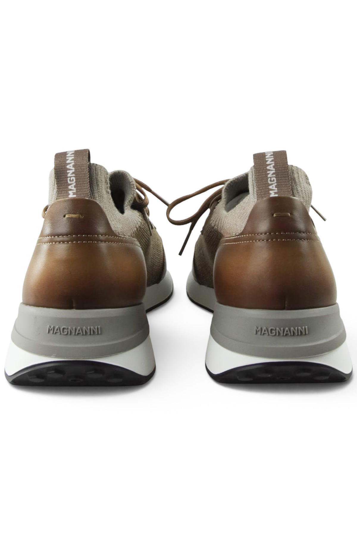Back view of tan lace-up knit and leather trainers with cushioned heel and logo tab