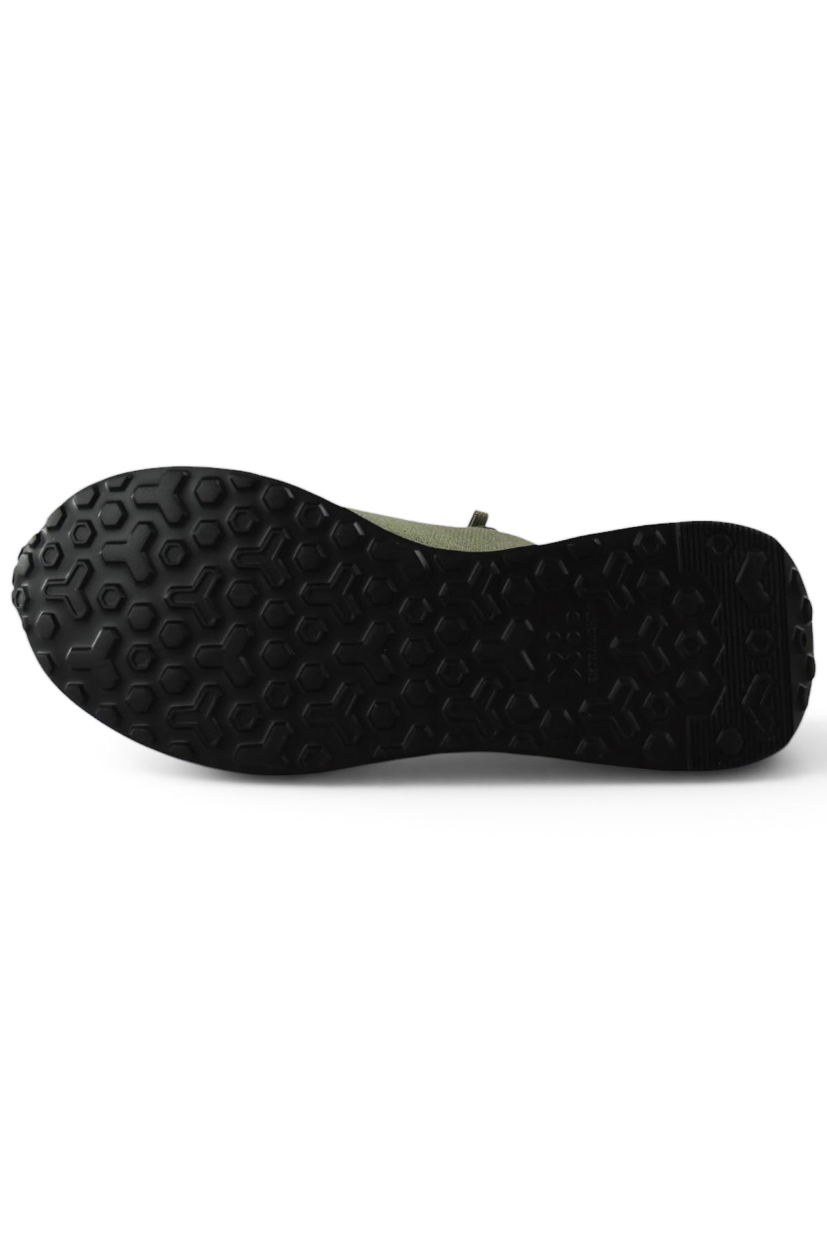 Khaki sneakers outsole view with textured tread and white midsole edge