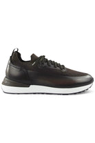 Dark brown knit and leather lace-up trainer with textured panel and white rubber sole.