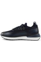 Dark blue low-top lace-up trainers with knit upper, leather toe cap, and white midsole