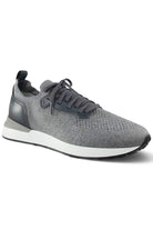 Grey lace-up trainer with knitted upper, side leather panel, and low-profile sole