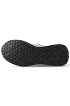 Black treaded rubber outsole for grey knitted leather trainer