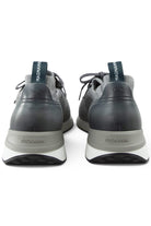Back view of grey trainers with leather heel, pull tab, and cushioned sole