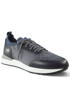 Men's lace-up trainers with grey knit upper, dark leather side panels, white midsole