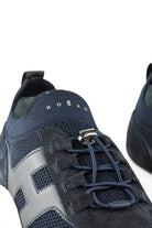 Navy knitted trainer sneaker tongue with lace-up eyelets and silver hook hardware