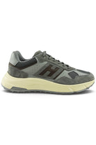 Grey running trainer with suede overlays, perforations, lace-up front, and cushioned sole