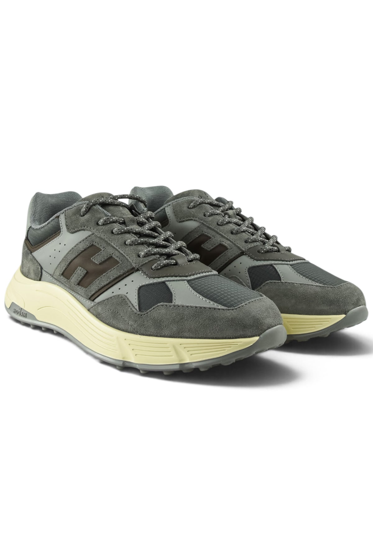 Grey and off-white lace-up running shoes with suede panels and thick light yellow sole
