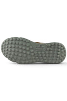 Hogan runner trainer outsole with dark tread dots and heel traction