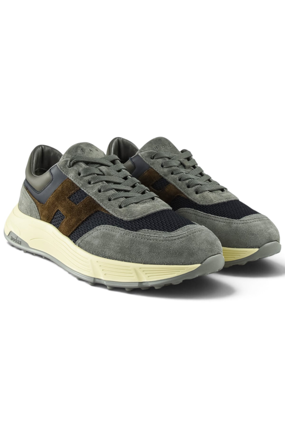 Hogan runner trainer pair view with grey laces, blue panels, brown suede accents