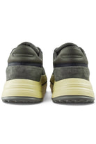 Hogan runner trainer heel view with cushioned dark lining and cream midsole