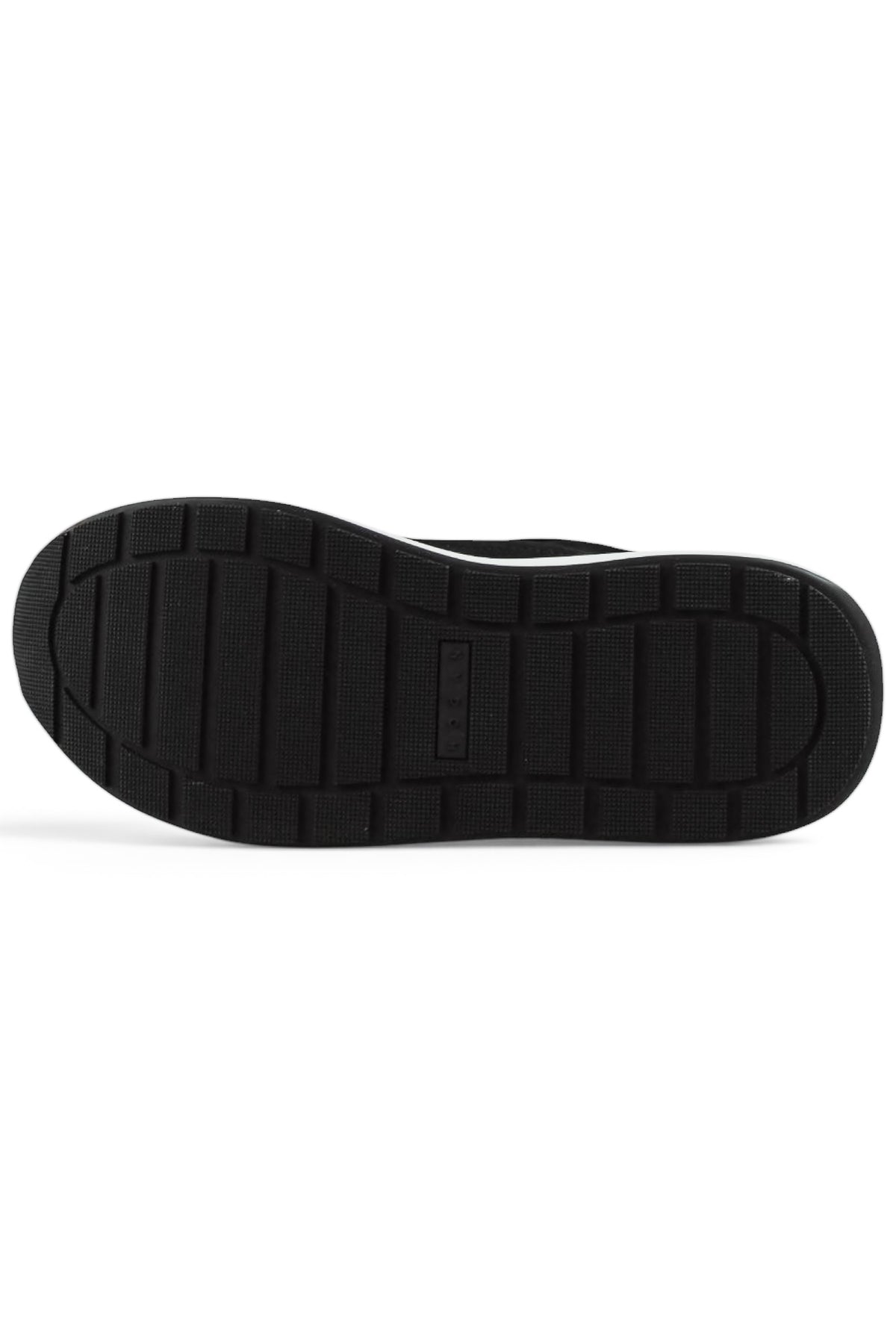 Black rubber outsole with textured tread pattern under the sneaker