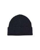 Navy knitted wool beanie with ribbed cuff, folded edge, and stitched crown seam