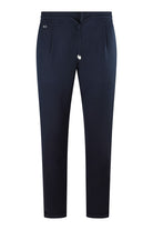 Navy textured jersey pants with elastic waist and drawstring, tapered leg