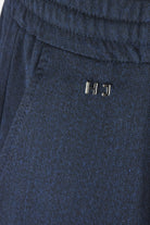 Navy textured jersey pants with HKJ logo detail and elastic waistband