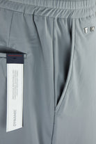 Seafoam grey drawstring pants with inner waistband label and pocket seam detail